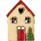 Hus i keramikk til telys, hjerte og juletre foran huset thumbnail